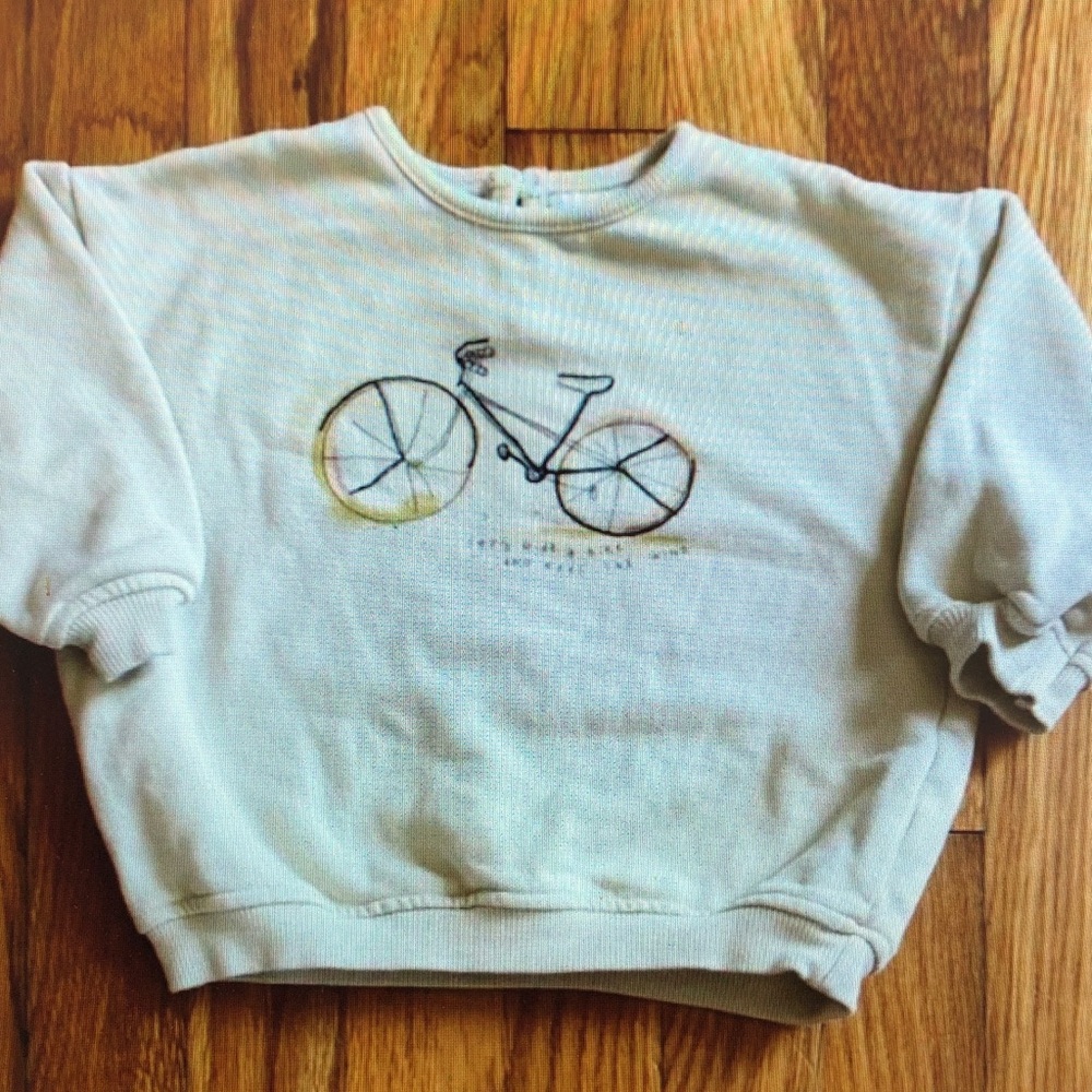 Cream Sweatshirt with Bicycle Design